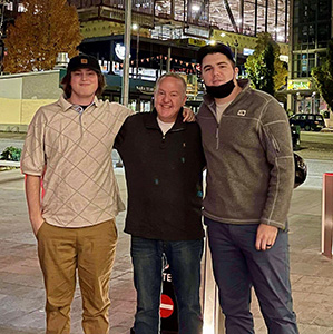 Dennis with sons