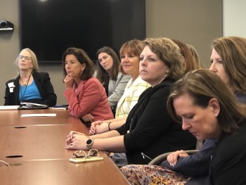 Women sitting around a conference table